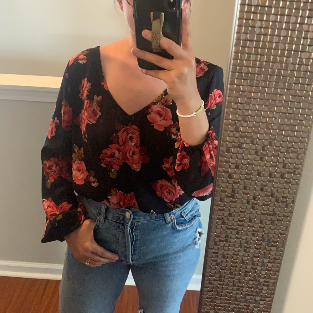 Black cute blouse with red roses.